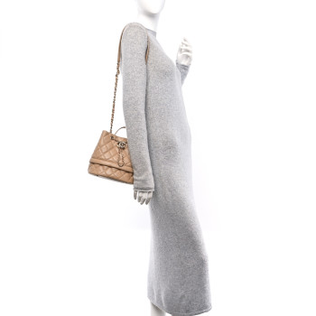 CHANEL Caviar Quilted Rolled Up Bucket Drawstring Bag Beige